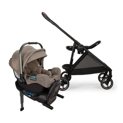Nuna Flex System Frame in black with Pipa Rx infant car seat in cedar color attached, featuring safety harness and adjustable sunshade.