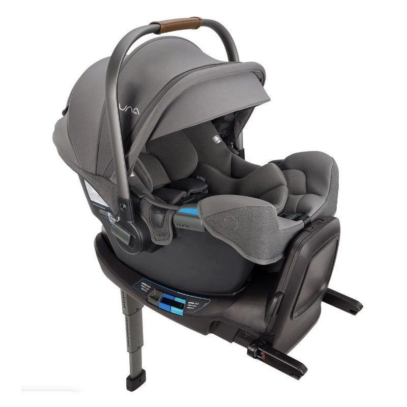Granite Nuna Flex System Frame with Pipa Rx infant car seat, featuring a grey fabric cover and adjustable handlebar.