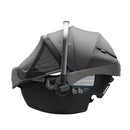 Nuna Pipa Rx infant car seat in granite color, featuring a protective canopy and a safety handle.
