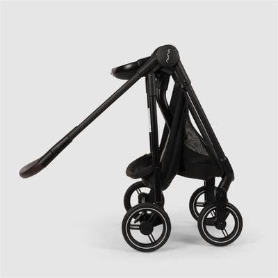 Nuna Flex System Frame in Caviar color, featuring a sleek design, extendable handle, and four wheels for mobility.
