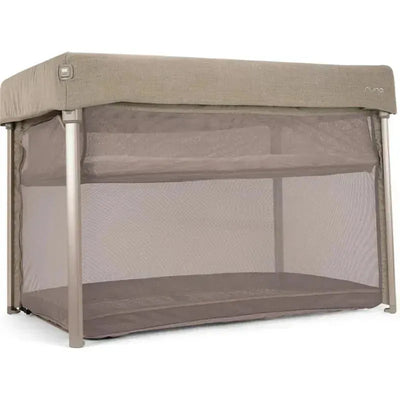 Nuna Paal Playard in Cedar color featuring a breathable mesh design and a removable, padded mattress.