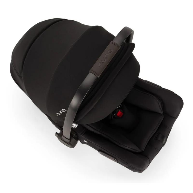 Nuna Pipa Aire Rx infant car seat in Caviar/Chocolate, featuring a sleek black design and safety harness.