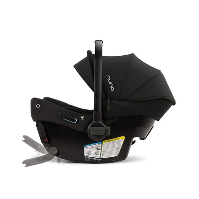 Nuna Pipa Urbn infant car seat in black with an adjustable canopy and safety label on the side.