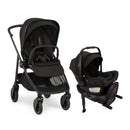 Nuna Swiv stroller in black with a car seat next to it, both designed for infants and toddlers.