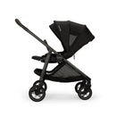 Nuna Swiv + Pipa Aire Rx Travel System in Caviar/Chocolate, featuring a sleek black stroller with a protective canopy and mesh details.