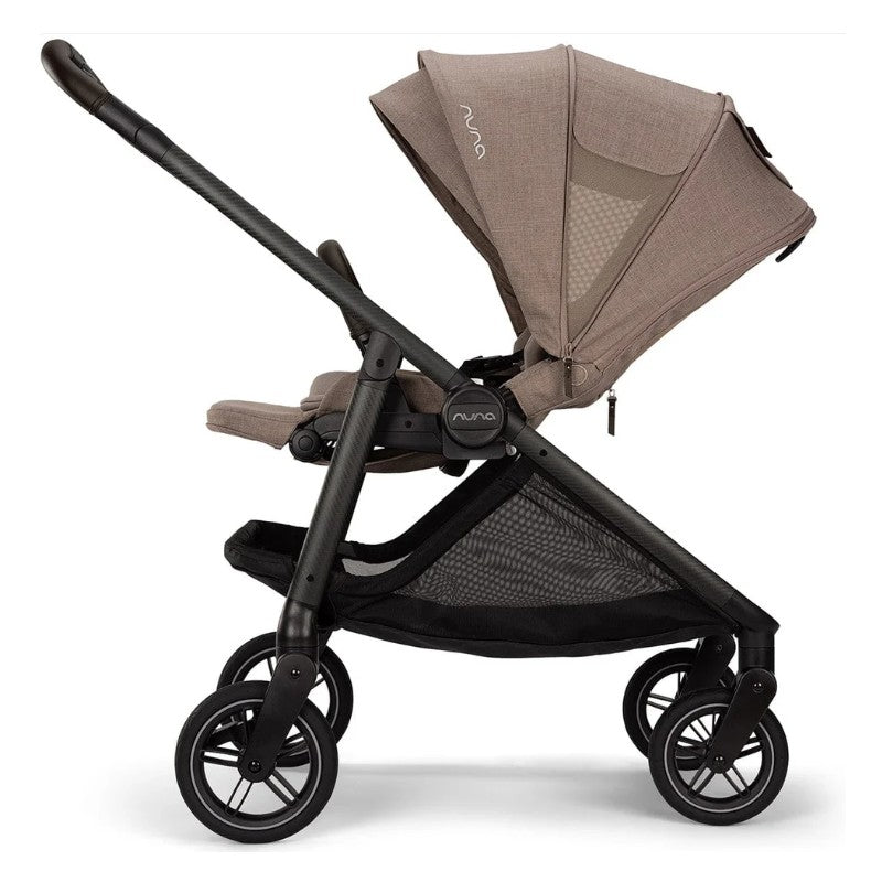 Nuna Swiv stroller in Cedar color with a mesh canopy, adjustable seat, and sleek black frame.