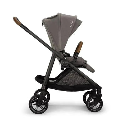 Nuna SWIV™ Stroller in Granite with a grey canopy, adjustable seat, and black frame, showcasing its modern design.