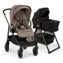 Nuna Swiv stroller in cedar and caviar colors alongside the Swiv bassinet and stand, showcasing their sleek design and functionality.
