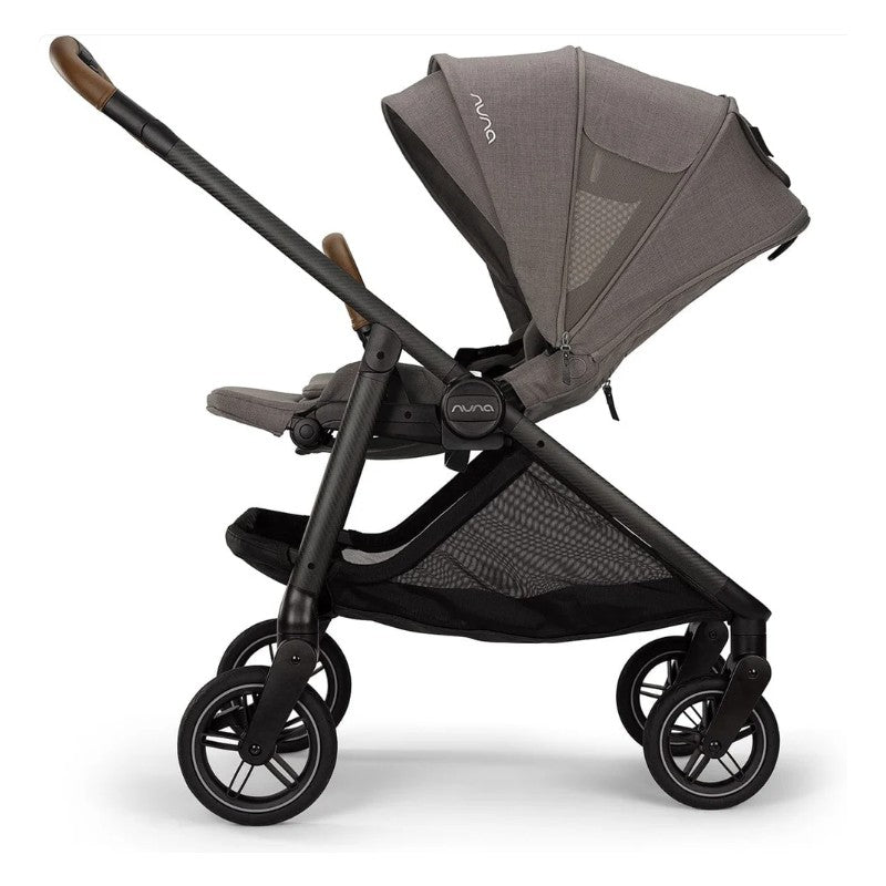 Nuna Swiv stroller in granite color with a caviar base, featuring a high canopy, adjustable seat, and smooth-rolling wheels.