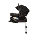 Nuna Triv Lx +Pipa Aire travel system bundle in Caviar color, featuring an infant car seat and base with safety labels.