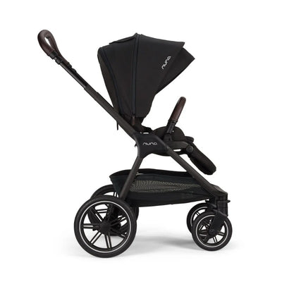 Nuna Triv Lx stroller in Caviar color, featuring a sleek design, adjustable canopy, and spacious storage basket.