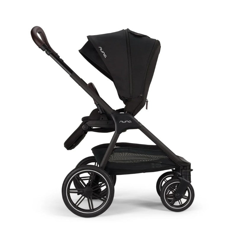 Nuna Triv LX stroller in black with a large canopy, adjustable handle, and spacious storage basket underneath.