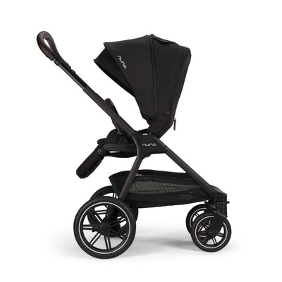 Nuna Triv LX stroller in black with a large canopy, adjustable handle, and spacious storage basket underneath.