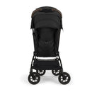 Nuna Trvl 360 Compact Stroller in Caviar color, featuring a padded seat, adjustable canopy, and a sturdy frame.