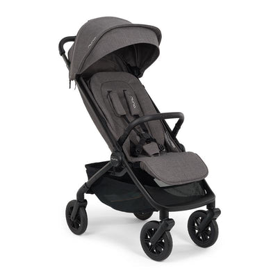 Nuna Trvl 360 Compact Stroller in Pewter color, featuring a sleek design, adjustable canopy, and safety harness.