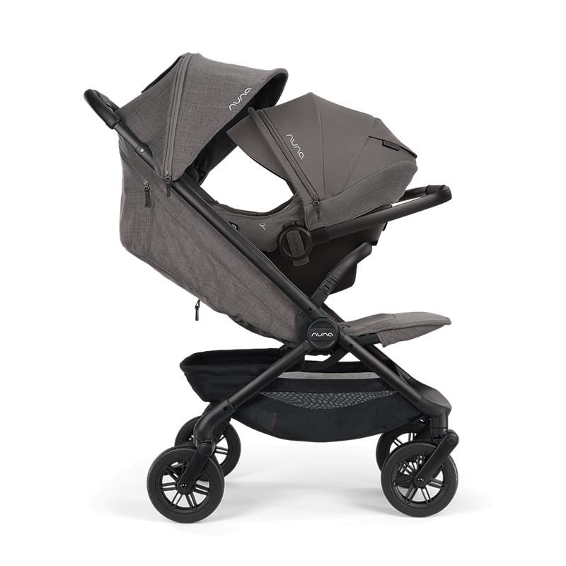 Nuna Trvl 360 Compact Stroller in Pewter, featuring a sleek design, large canopy, and adjustable seat for infant use.