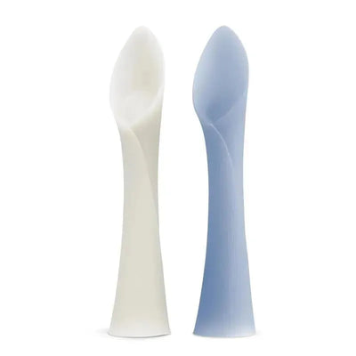 Two soft-tip training spoons for babies in pearl and blueberry colors, designed for baby-led weaning.
