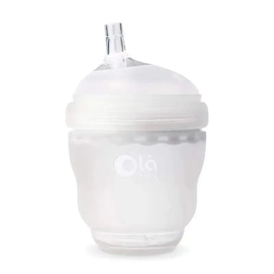 Ola Baby Gentle Bottle with a straw lid; clear design features a gentle spout for easy sipping.
