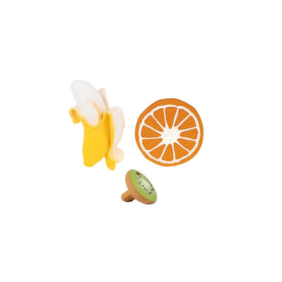 Newborn gift set featuring a banana toy, orange slice, and kiwi-shaped accessory, all made from soft materials.