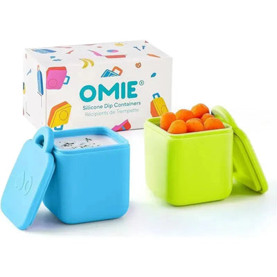 Leakproof silicone dip containers in blue and lime, with one filled with orange snacks and the other with dip.