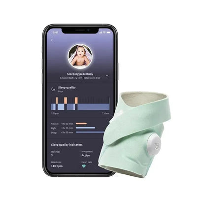 Owlet Dream Sock Monitor in mint color next to a smartphone displaying sleep data, including sleep quality and heart rate.