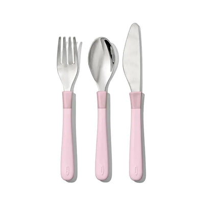 Oxo Tot Cutlery set for big kids in Blossom color, featuring a fork, spoon, and knife with pink handles.