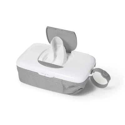 Oxo Tot On-the-Go Wipes Dispenser in grey, featuring a flip-open lid with wipes partially exposed and a carry ring.