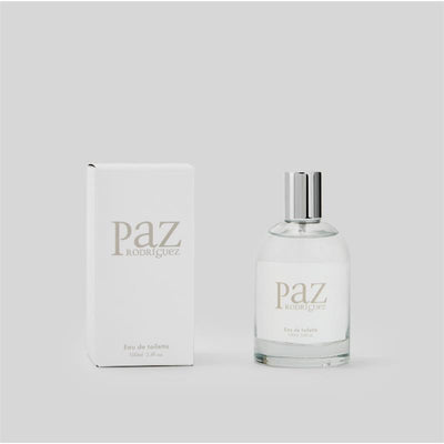 Baby set by Paz Rodriguez featuring a fragrance and a teddybear-themed design, presented in a clear bottle with a silver cap.