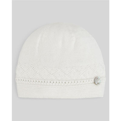 Light blue and cream knit newborn hat featuring a textured design and decorative button.