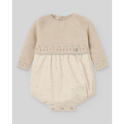 Knit newborn romper in light brown and chalk blue, featuring a textured top and dotted bottom, with long sleeves.