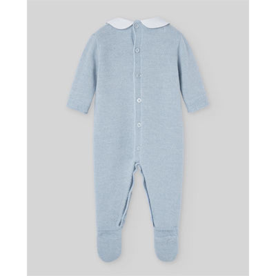 Knit newborn romper in chalk blue with a white collar, featuring long sleeves and button closures at the back.