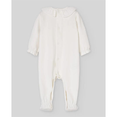 Cream-colored newborn romper with a collar, long sleeves, and button closure, featuring elasticized cuffs and legs.