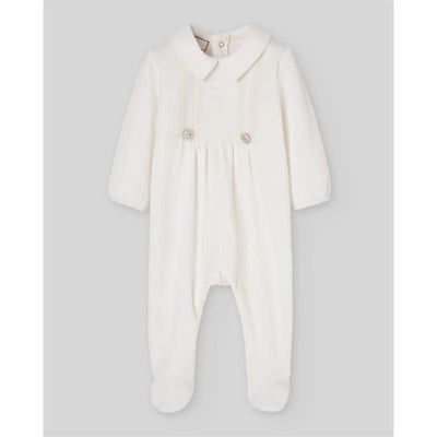 Cream-colored newborn romper with a collar, button details, and long sleeves. Ideal for infants.