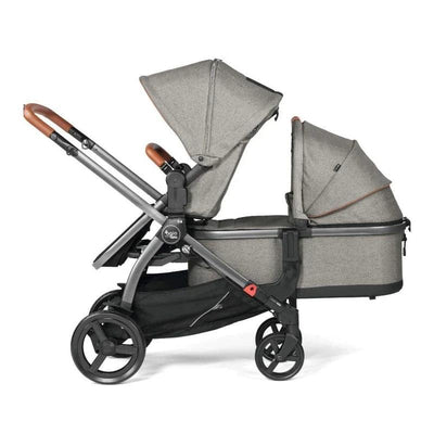 Peg Double Adapter for YPSI & Z4, featuring two hoods, grey fabric, and a sturdy frame with wheels for versatility.