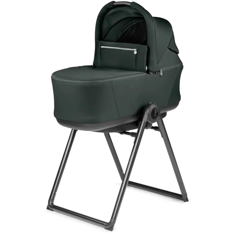 Peg Pop Up Bassinet Stand for City Loop, featuring a dark green fabric seat and a sturdy black frame.