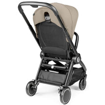 Full-size Peg-Perego City Loop stroller in Vanilla Blend, featuring a reversible seat, adjustable canopy, and smooth wheels.