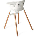 High chair with a white plastic seat and copper-colored legs, designed for children, showing a minimalist style.