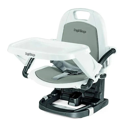 Rialto Booster Chair by Peg Perego in Ice Grey with a removable tray and adjustable safety harness.