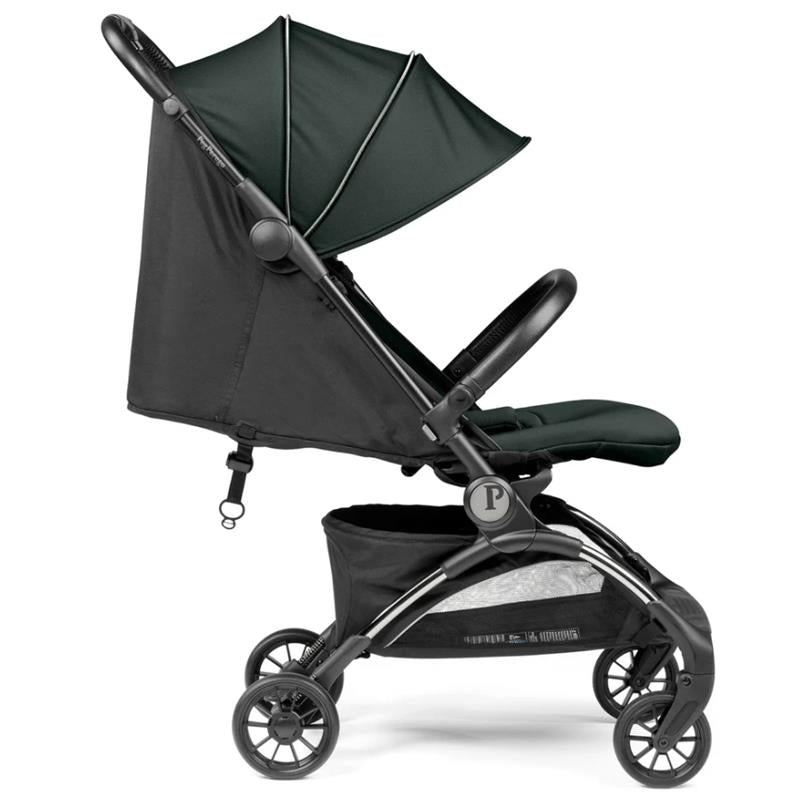 Peg Volo Compact Stroller in sage green with a reclining seat and large sun canopy, featuring a storage basket underneath.