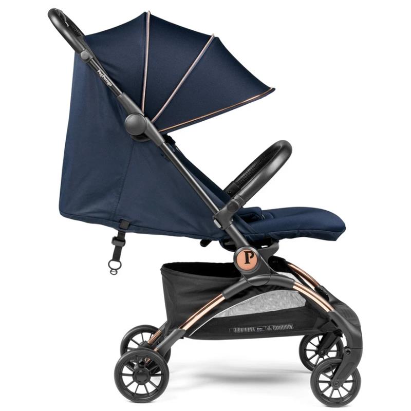 Peg Volo Compact Stroller in Blue Shine, featuring a large canopy, ergonomic handles, and a spacious storage basket.
