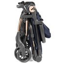 Compact Peg Perego Volo stroller in Blue Shine, featuring a sleek foldable design and lightweight frame with black wheels.