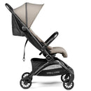 Peg Volo Compact Stroller in Misty Beige, featuring a lightweight design, adjustable canopy, and a spacious storage basket.