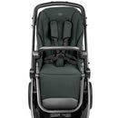 Sage green Peg Ypsi Single-to-Double Stroller seat with safety harness and padded support, seen from the front.