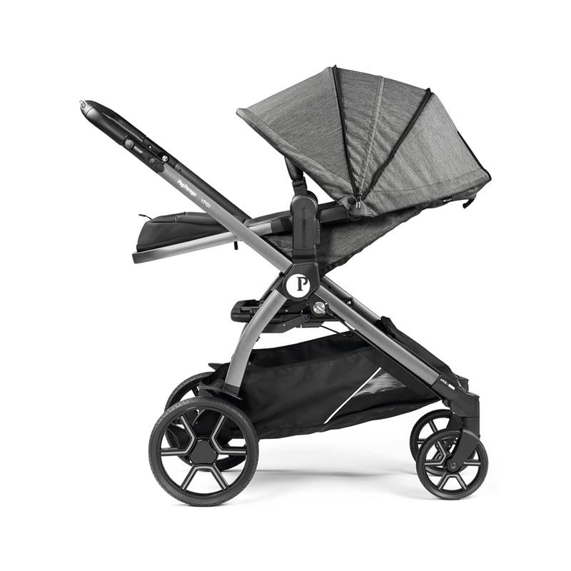 Peg Perego Ypsi Travel System in Vanilla Blend, showcasing a modern stroller with a foldable canopy and spacious storage basket.