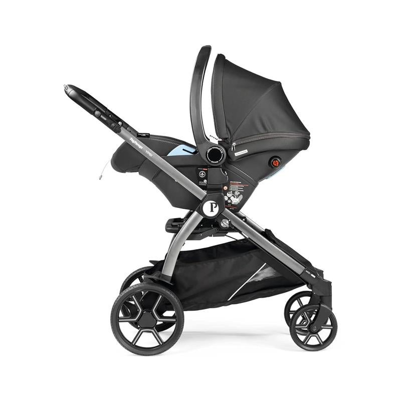 Peg Perego Ypsi Travel System in Vanilla Blend, featuring a stroller with a car seat attachment, sleek design, and a spacious under-basket.