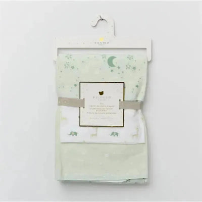Flannel receiving blankets in green with animal patterns, packaged with a label indicating product details.