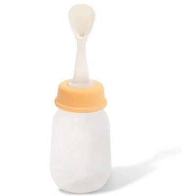 Pigeon baby weaning spoon attached to a squeezable 4 oz bottle with an orange cap, designed for children 6 months and older.