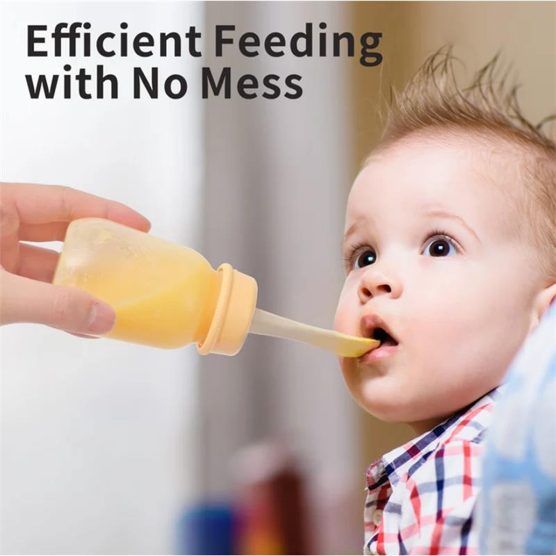 Pigeon Baby Weaning Spoon being used to feed a baby; features a squeeze bottle for mess-free feeding.