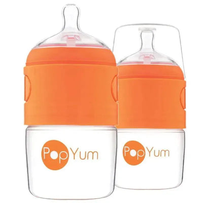 Two 5 oz PopYum baby bottles in clear plastic with orange silicone grips, designed to reduce colic.