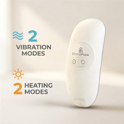 Primo Passi Lactation Massager showcasing a sleek white design, with icons indicating 2 vibration modes and 2 heating modes.
